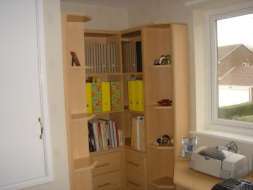Book shelves built into and alcove with drawers below (angled view)