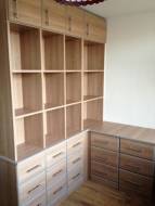 corner chest of drawers with shelving above with topbox cupboards