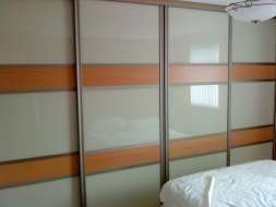 Pearl white glass doors with 2 beech dividers in light bronze frames