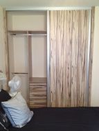 Artwood panel doors with matt silver frames, making a bold impression in the room (left door open)
